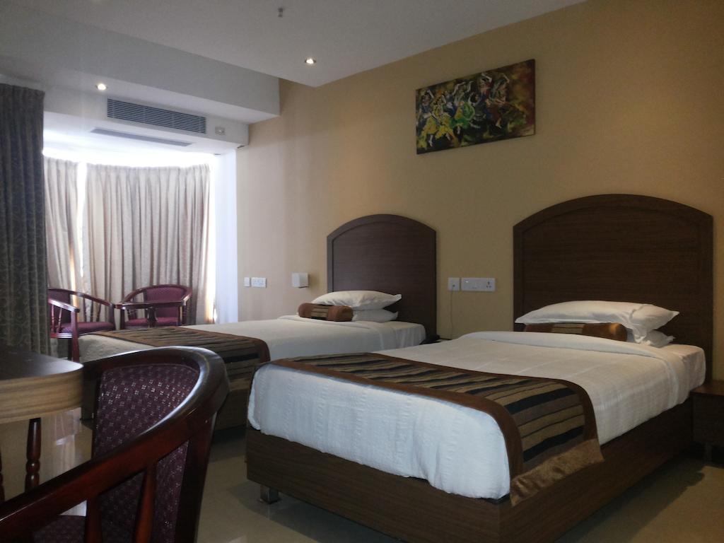 Hotel Milestonnez Sriperumbudur Bilik gambar